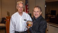Dr. Andrea Califano accepting an award from Fox Chase director Dr. Jonathan Chernoff